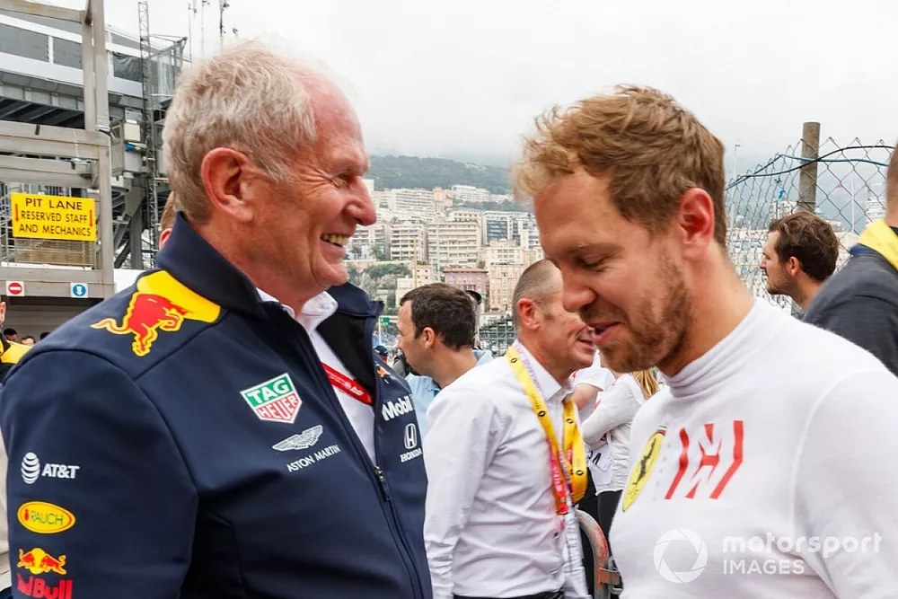 Helmut Markko, Consultant, Red Bull Racing, with Sebastian Vettel, Ferrari