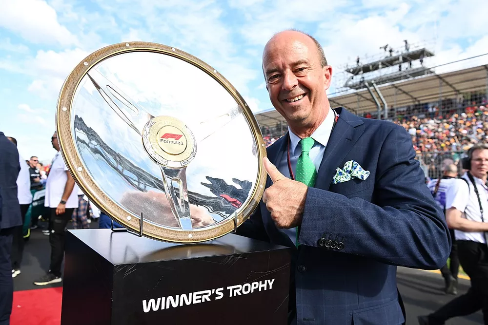 Andrew Westacott, Australian Grand Prix Corporation CEO
on the grid with the trophy