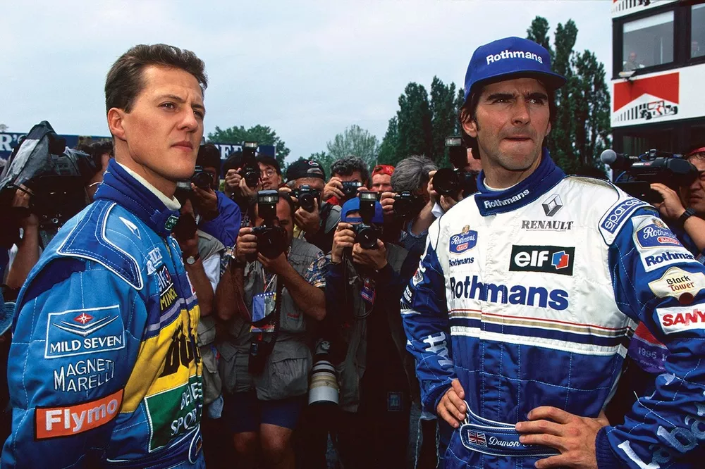 Michael Schumacher, Benetton B195 Renault, retired, with Race Winner Damon Hill, Williams FW17-Renault