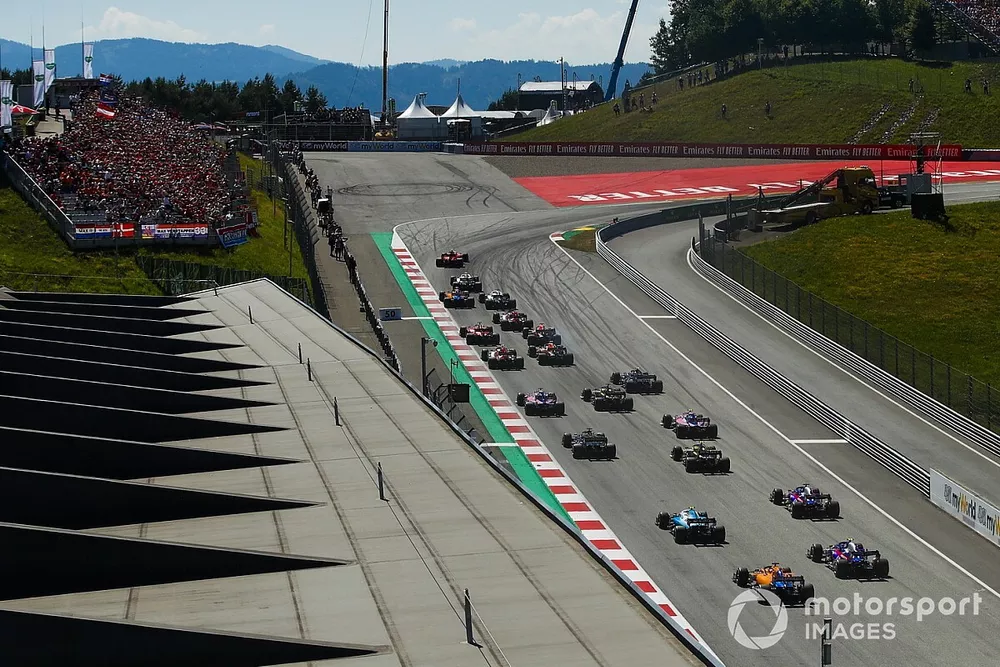 Charles Leclerc, Ferrari SF90, leads Valtteri Bottas, Mercedes AMG W10, Lewis Hamilton, Mercedes AMG F1 W10, Lando Norris, McLaren MCL34, Kimi Raikkonen, Alfa Romeo Racing C38, and the rest of the field at the start