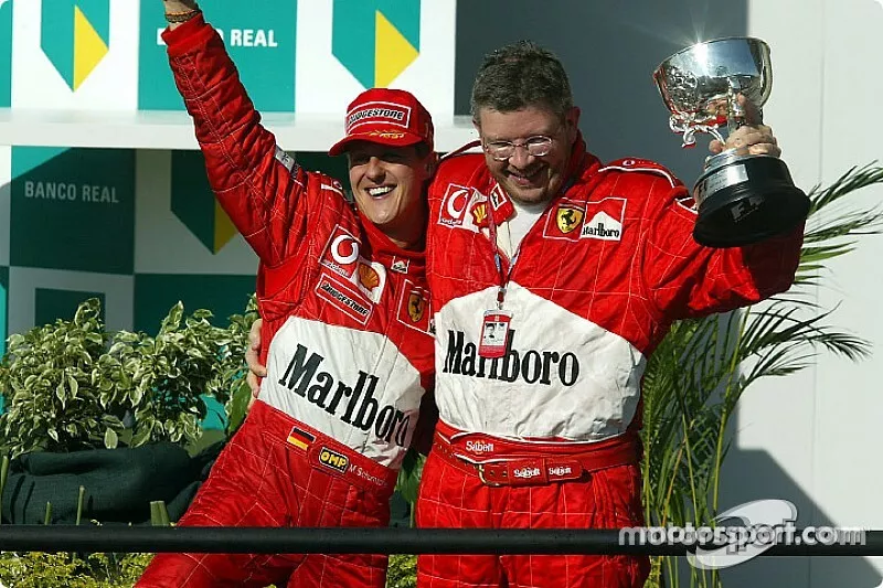 Race winner Michael Schumacher and Ross Brawn