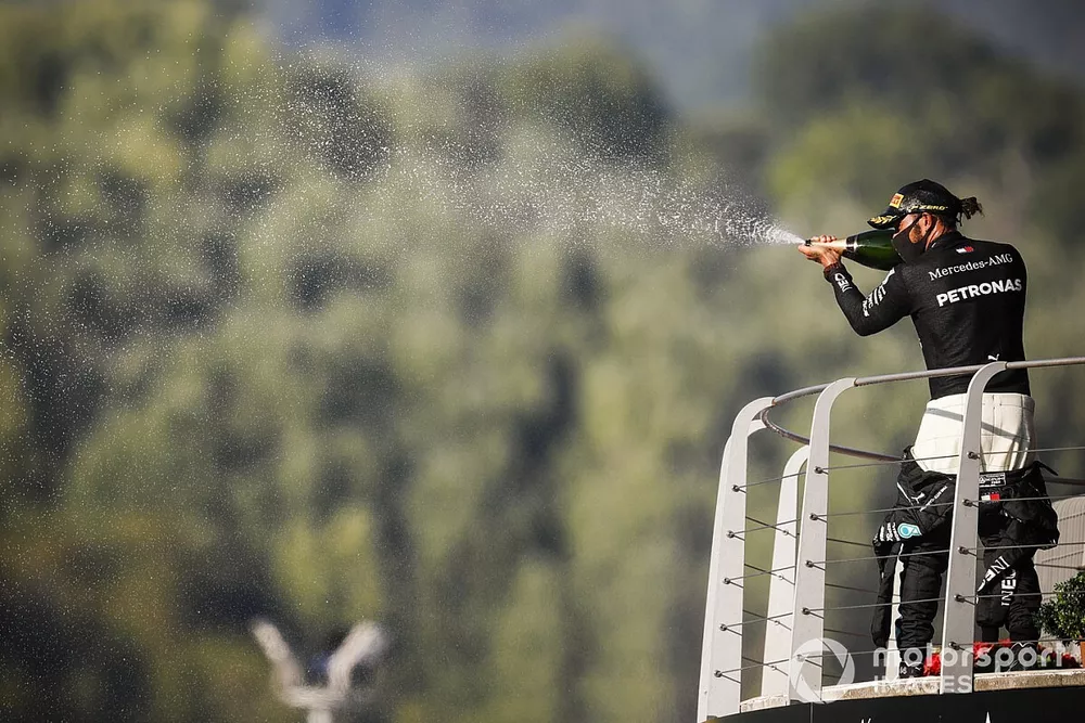 Lewis Hamilton, Mercedes-AMG F1, 1st position, sprays Champagne from the podium