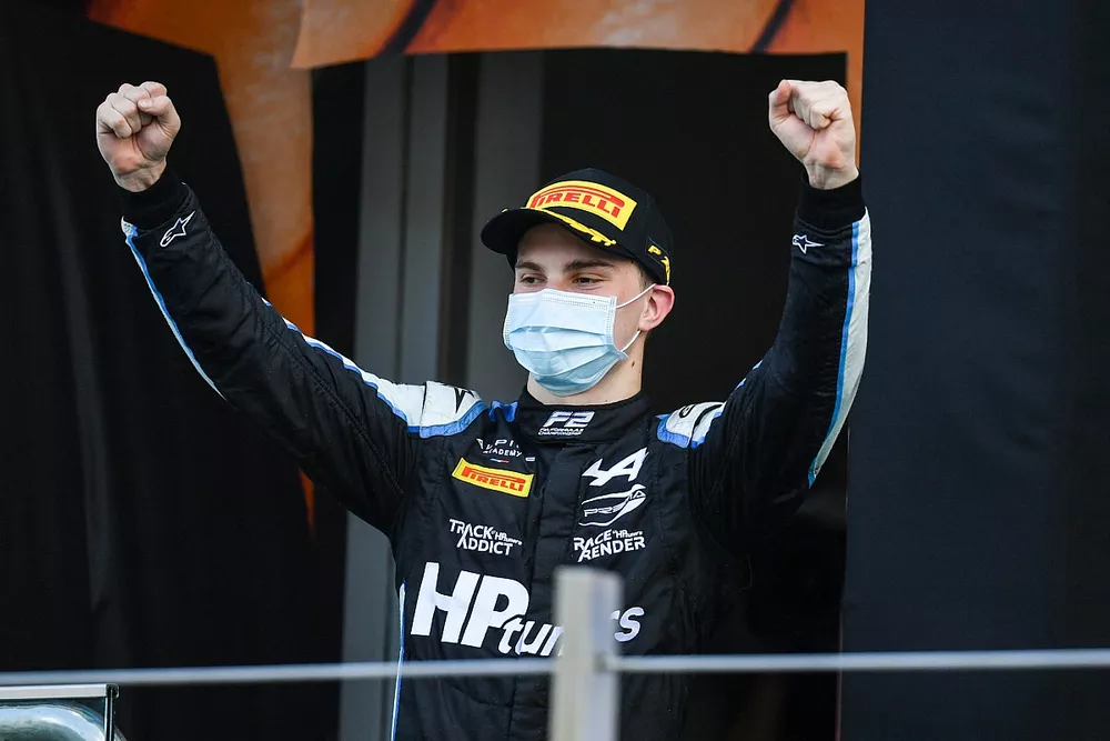 Oscar Piastri, Prema Racing celebrates victory on the podium 