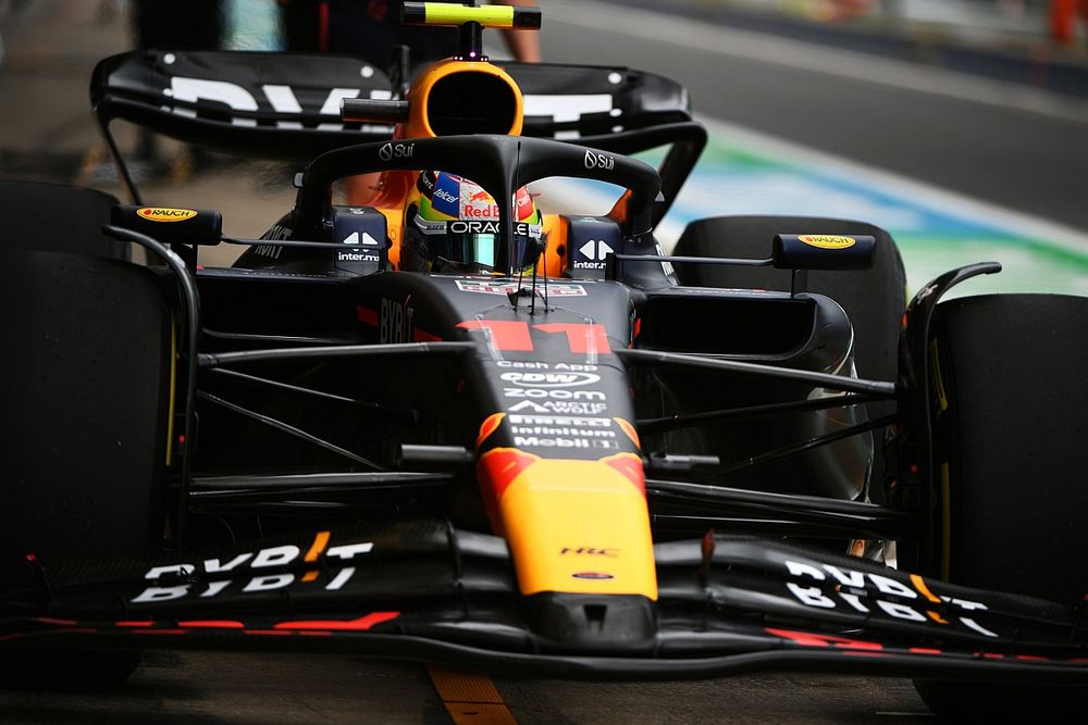 Sergio Perez, Red Bull Racing RB19, in the pits