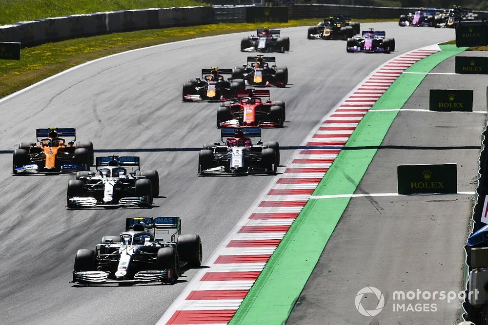 Valtteri Bottas, Mercedes AMG W10, leads Lewis Hamilton, Mercedes AMG F1 W10, Lando Norris, McLaren MCL34, Kimi Raikkonen, Alfa Romeo Racing C38, Sebastian Vettel, Ferrari SF90, Max Verstappen, Red Bull Racing RB15, Pierre Gasly, Red Bull Racing RB15, and the remainder of the field at the start