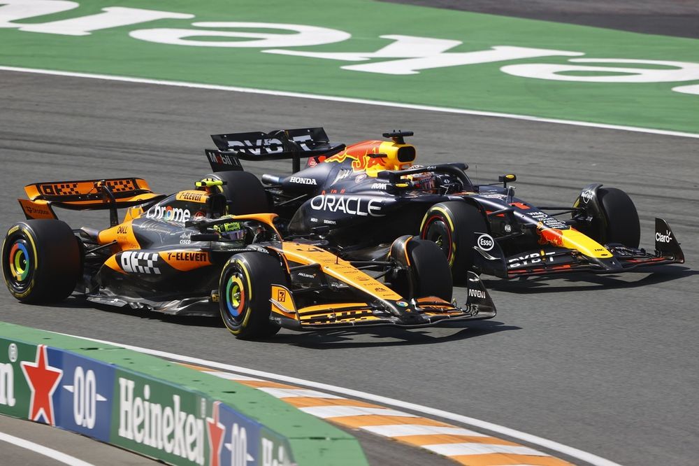 Lando Norris, McLaren MCL38, battles with Max Verstappen, Red Bull Racing RB20