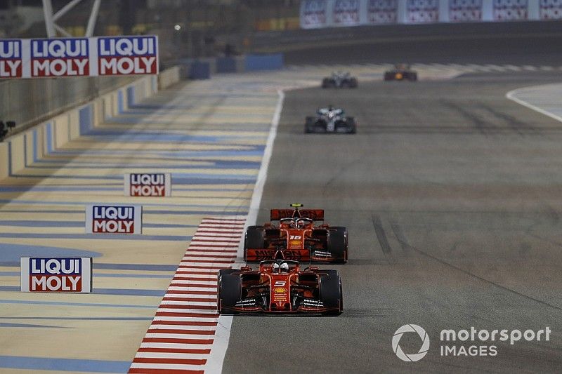 Sebastian Vettel, Ferrari SF90, leads Charles Leclerc, Ferrari SF90, and Lewis Hamilton, Mercedes AMG F1 W10