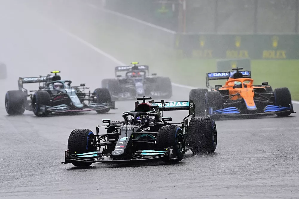 Sir Lewis Hamilton, Mercedes W12, Daniel Ricciardo, McLaren MCL35M, and Sebastian Vettel, Aston Martin AMR21