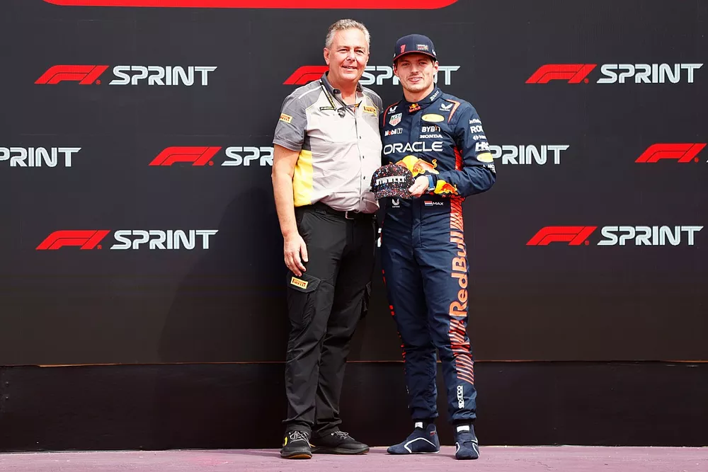 Mario Isola, Racing Manager, Pirelli Motorsport presents Sprint Poleman Max Verstappen, Red Bull Racing with the Sprint Shootout Award in Parc Ferme