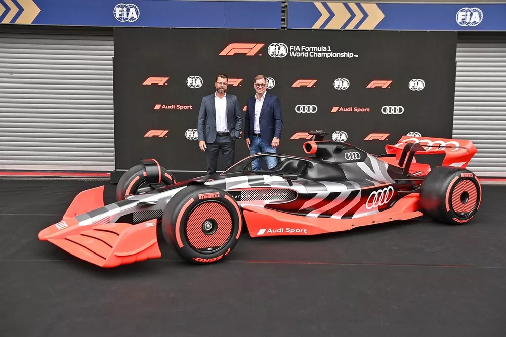 Oliver Hoffmann, Head of Technical Development at Audi Sport GmbH, with Markus Duesmann, Chairman of the Board of Management of Audi AG, with the new Audi Sport concept car