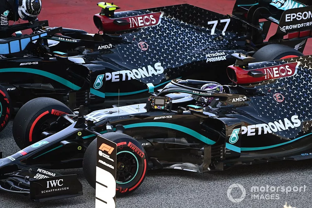 Lewis Hamilton, Mercedes F1 W11 EQ Performance, arrives in Parc Ferme after securing pole