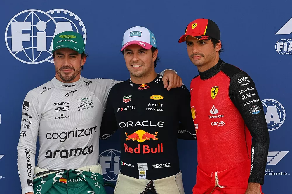 Top three Qualifiers Fernando Alonso, Aston Martin F1 Team, pole man Sergio Perez, Red Bull Racing, and Carlos Sainz, Scuderia Ferrari