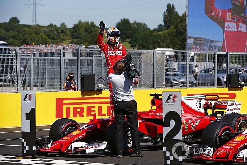 Ganador de la pole Sebastian Vettel, Ferrari