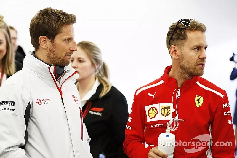 Romain Grosjean, Haas F1 Team, and Sebastian Vettel, Ferrari