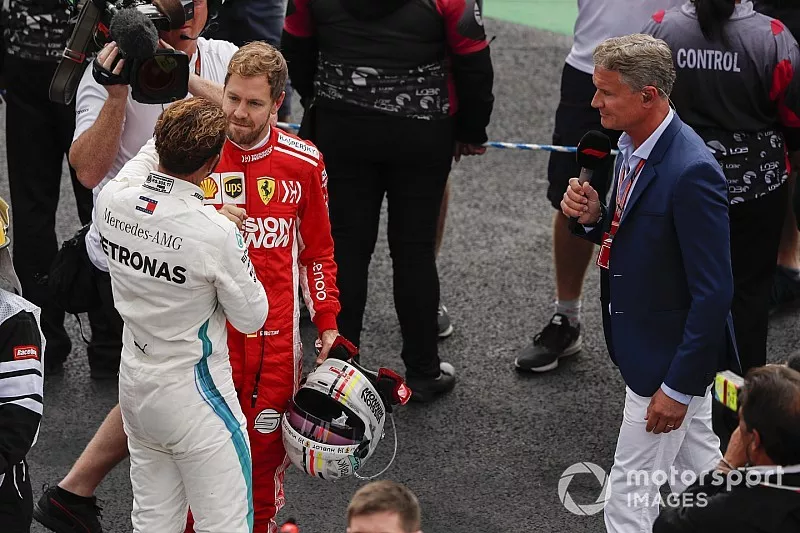 Title rival Sebastian Vettel, Ferrari, offers his congratulations to drivers championship winner Lewis Hamilton, Mercedes AMG F1