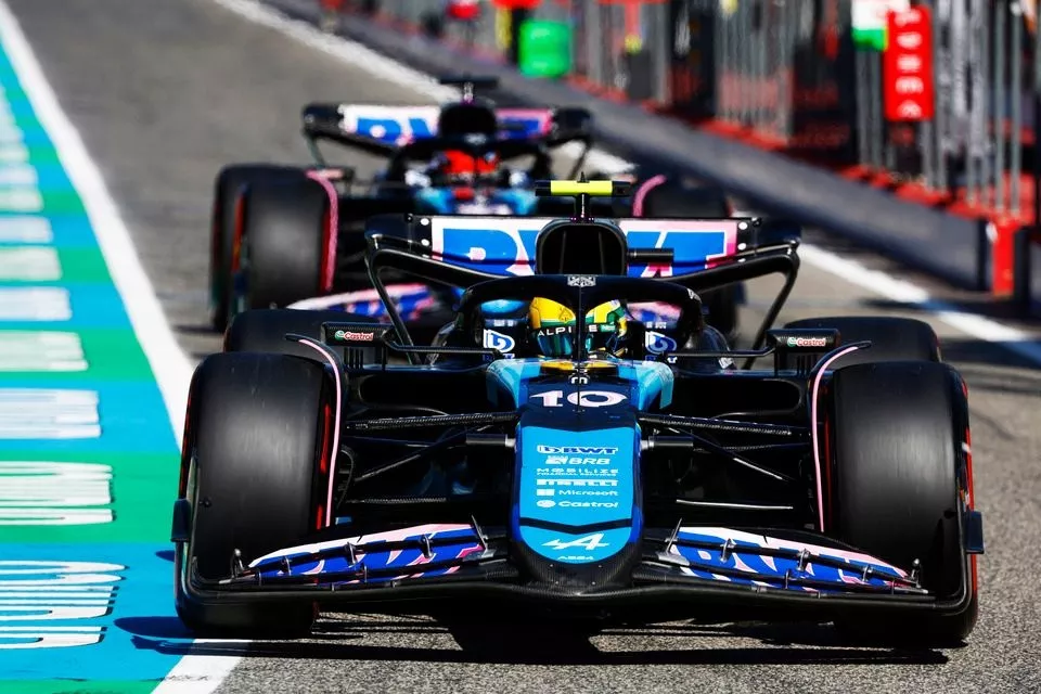 Pierre Gasly, Alpine A524, Esteban Ocon, Alpine A524, out of the pit lane