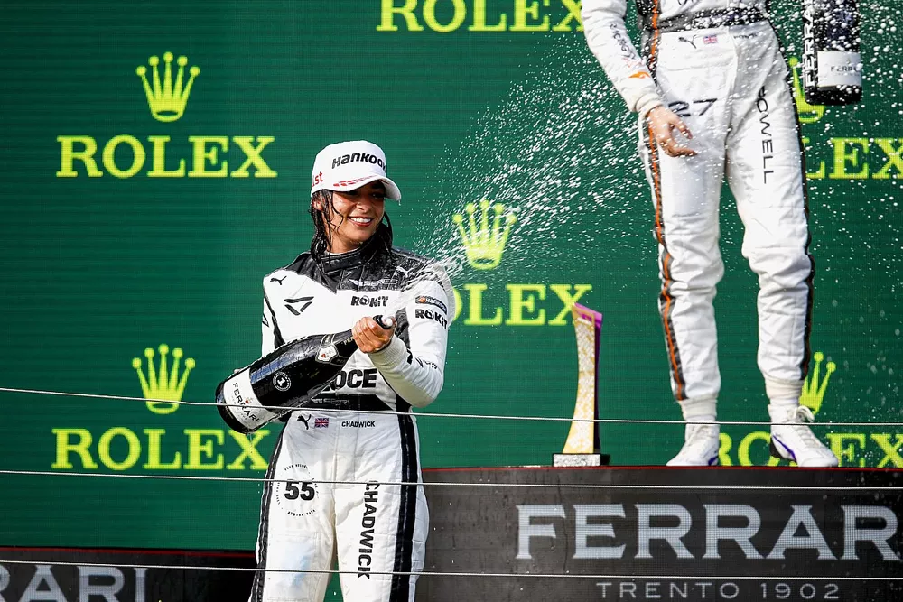 Race Winner Jamie Chadwick celebrates on the podium