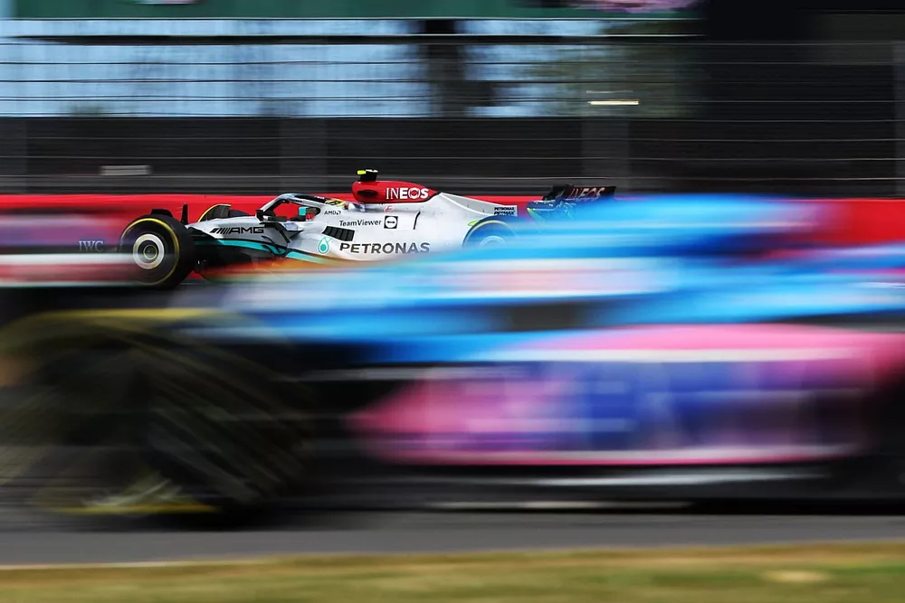 Lewis Hamilton, Mercedes W13 and an Alpine in action
