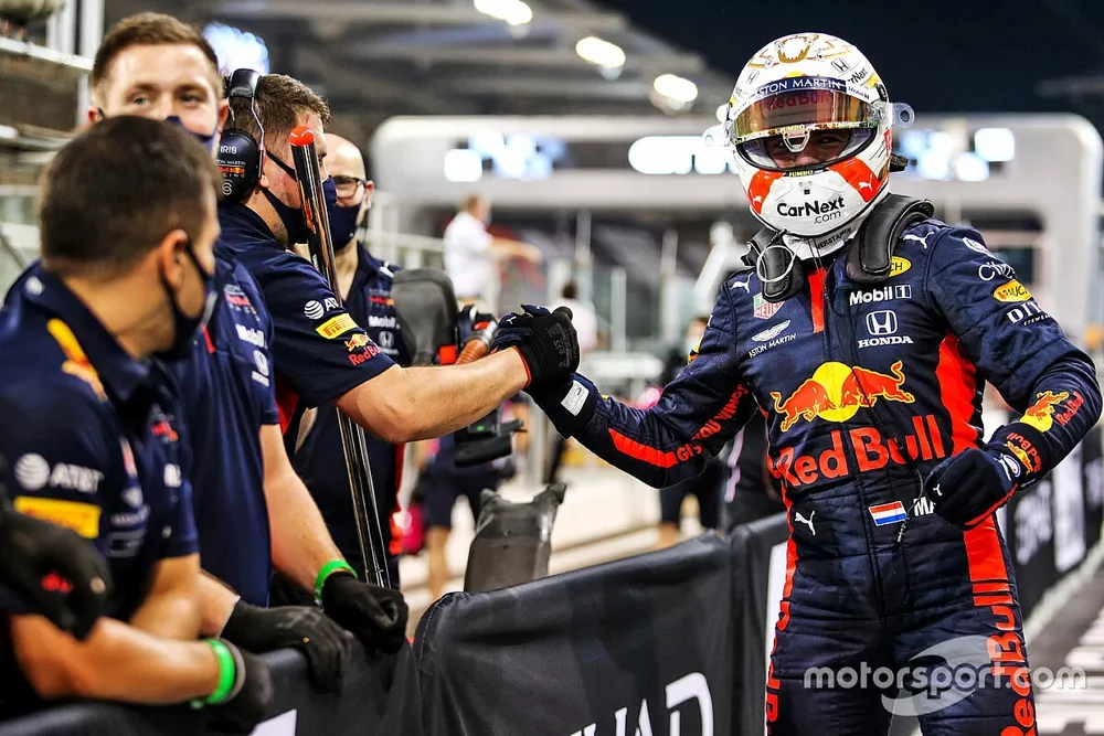 Max Verstappen, Red Bull Racing, celebrates with his team after securing pole position