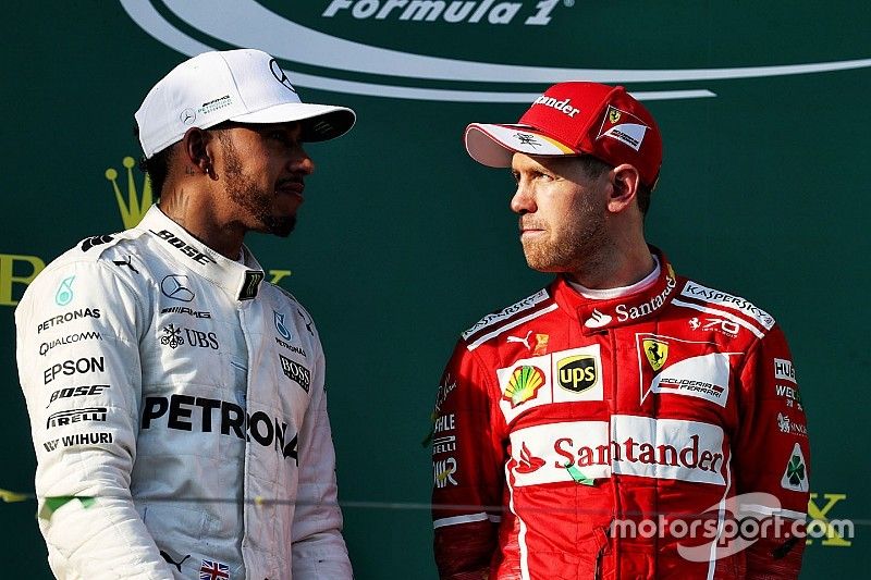Podium: winner Sebastian Vettel, Ferrari, second place Lewis Hamilton, Mercedes AMG F1