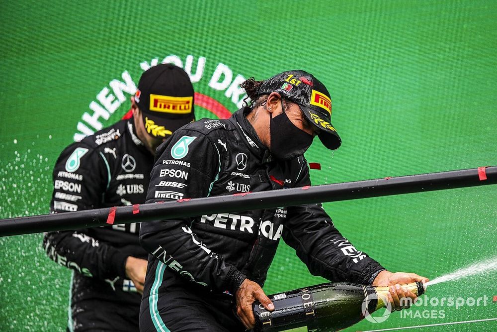 Race Winner Lewis Hamilton, Mercedes-AMG F1 and Valtteri Bottas, Mercedes-AMG F1 celebrate on the podium with the chamapagne