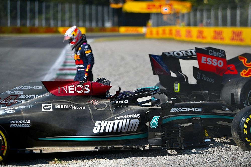 Max Verstappen, Red Bull Racing, walks away from his damaged car