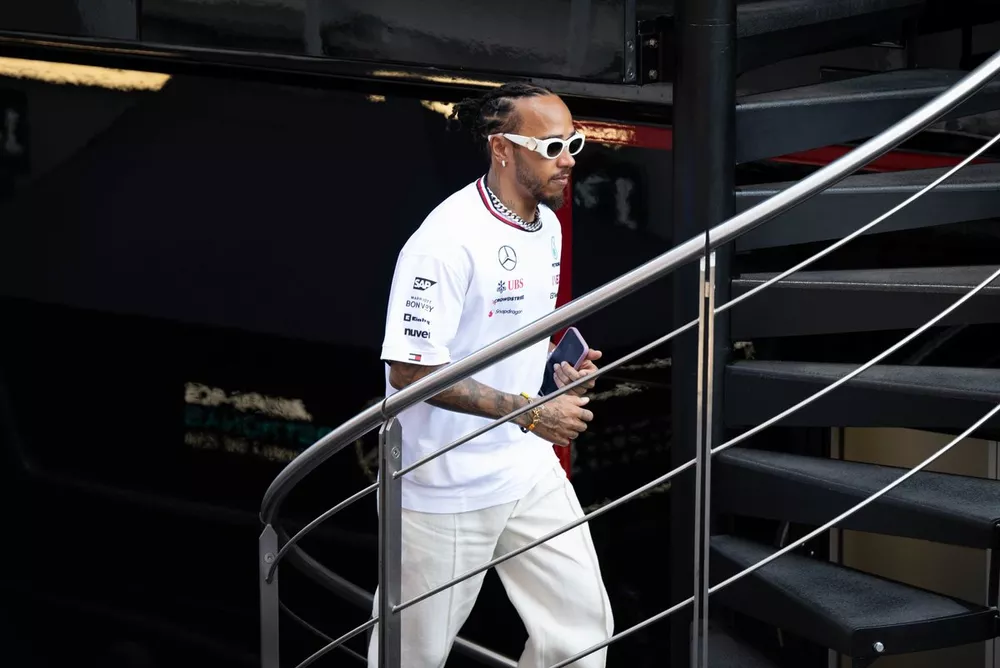 Lewis Hamilton, Mercedes-AMG F1 Team, walks up the stairs of the Mercedes AMG hospitality unit