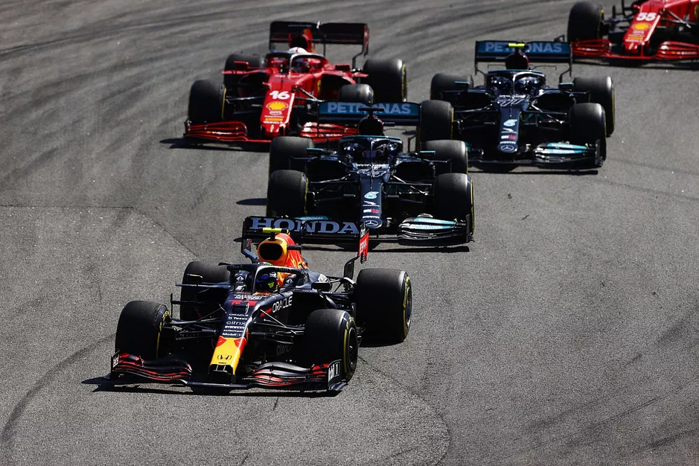 Sergio Perez, Red Bull Racing RB16B, Lewis Hamilton, Mercedes W12, Valtteri Bottas, Mercedes W12, Charles Leclerc, Ferrari SF21, and Carlos Sainz Jr., Ferrari SF21