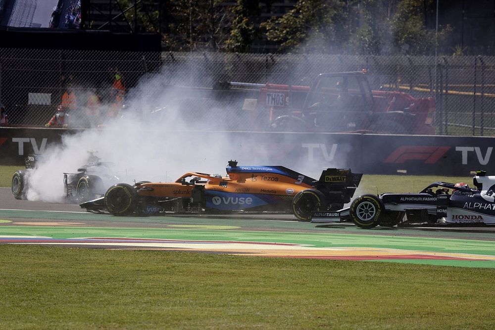 Valtteri Bottas, Mercedes W12, Daniel Ricciardo, McLaren MCL35M, and Yuki Tsunoda, AlphaTauri AT02, get caught up in an incident at the start of the race