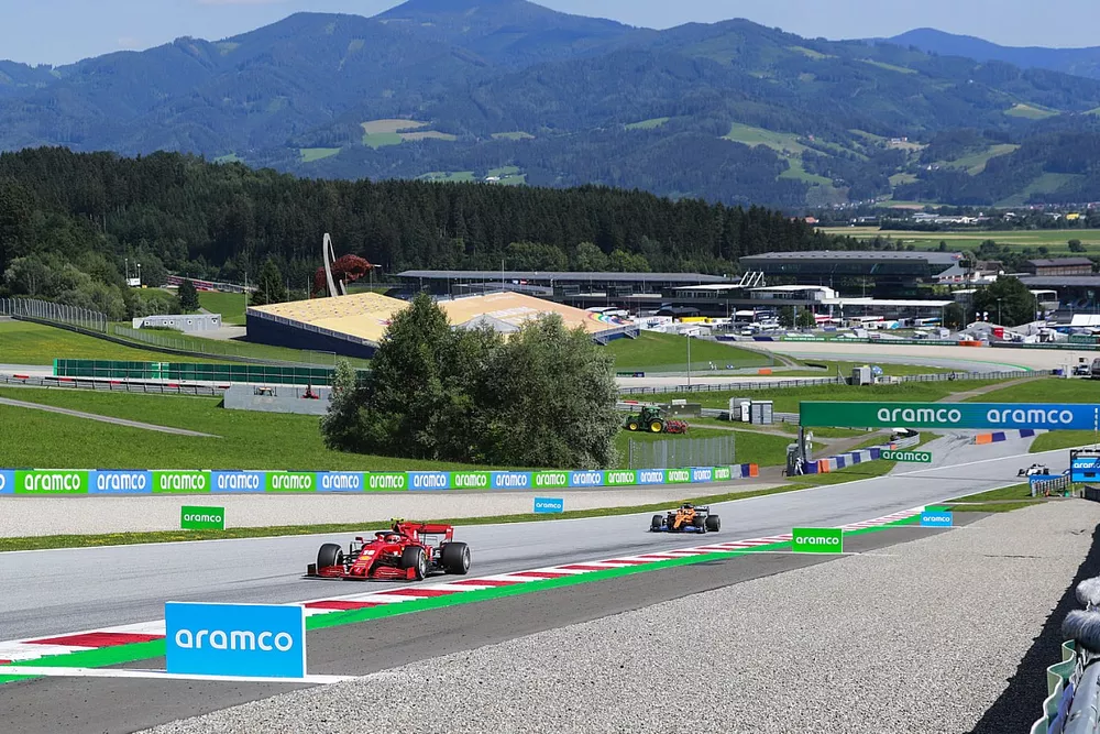 Charles Leclerc, Ferrari SF1000, Carlos Sainz Jr., McLaren MCL35
