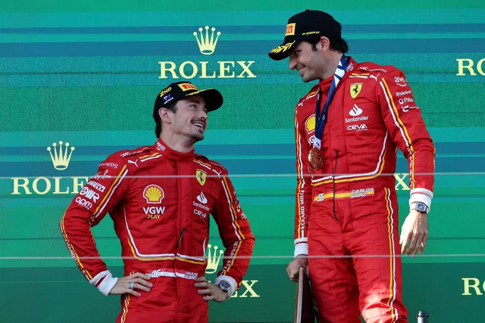 Charles Leclerc, Scuderia Ferrari, 2nd position, Carlos Sainz, Scuderia Ferrari, 1st position, talk on the podium