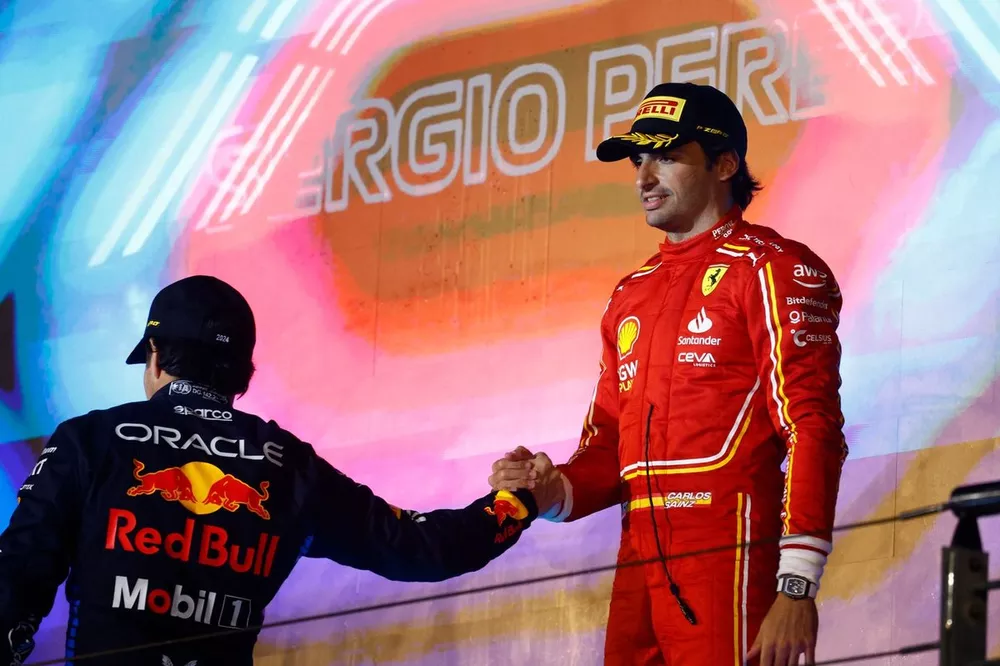Sergio Perez, Red Bull Racing, 2nd position, Carlos Sainz, Scuderia Ferrari, 3rd position, congratulate each other on the podium