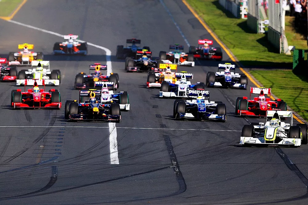 Jenson Button, Brawn Grand Prix BGP 001 leads at the start of the race