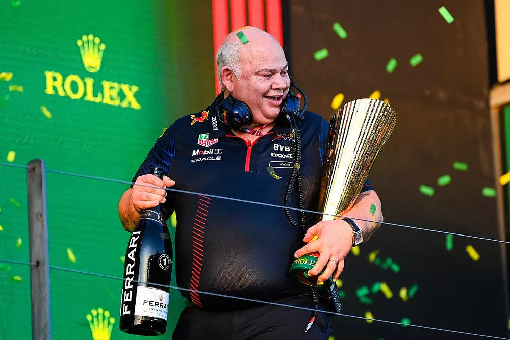 The Red Bull trophy delegate leaves the podium with the Construtors trophy