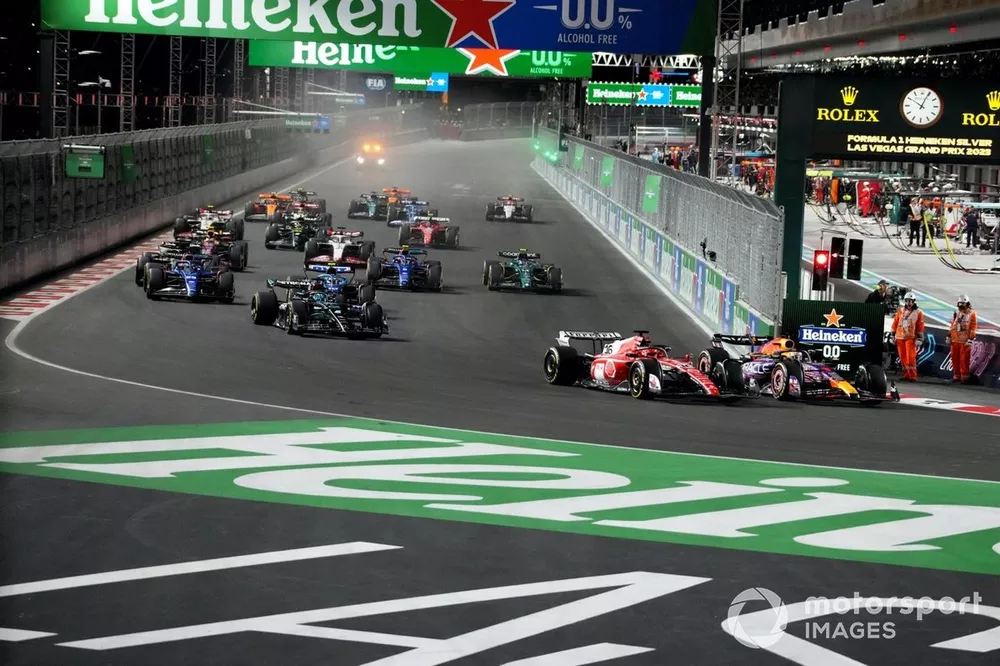 Charles Leclerc, Ferrari SF-23, battles with Max Verstappen, Red Bull Racing RB19, ahead of George Russell, Mercedes F1 W14, Pierre Gasly, Alpine A523, Alex Albon, Williams FW45, Logan Sargeant, Williams FW45, the rest of the field at the start