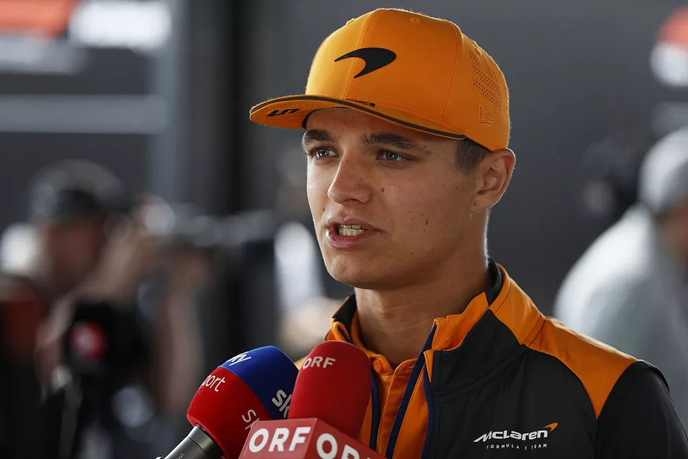 Lando Norris, McLaren, talks to the press 