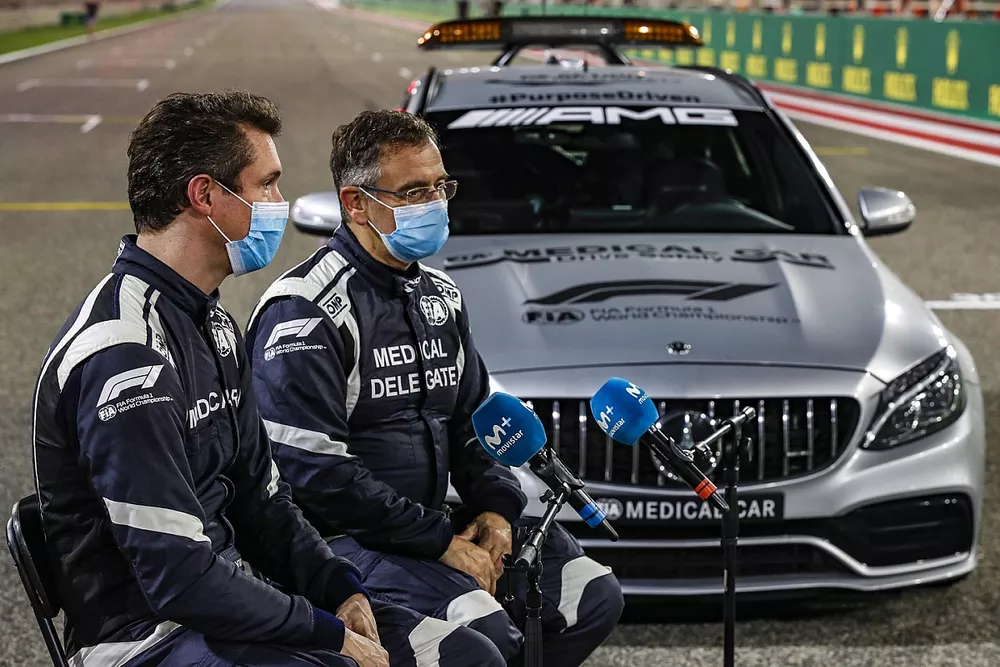 Alan van der Merwe, Medical Car Driver, FIA, and Dr Ian Roberts, talk to the press 
