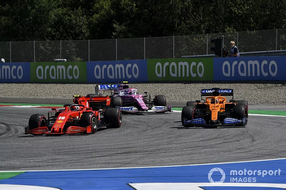 Charles Leclerc, Ferrari SF1000, leads Carlos Sainz Jr., McLaren MCL35, and Lance Stroll, Racing Point RP20