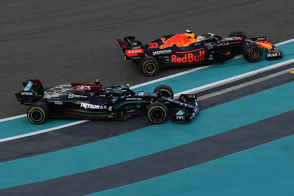 Lewis Hamilton, Mercedes and Max Verstappen, Red Bull Racing battle for lead