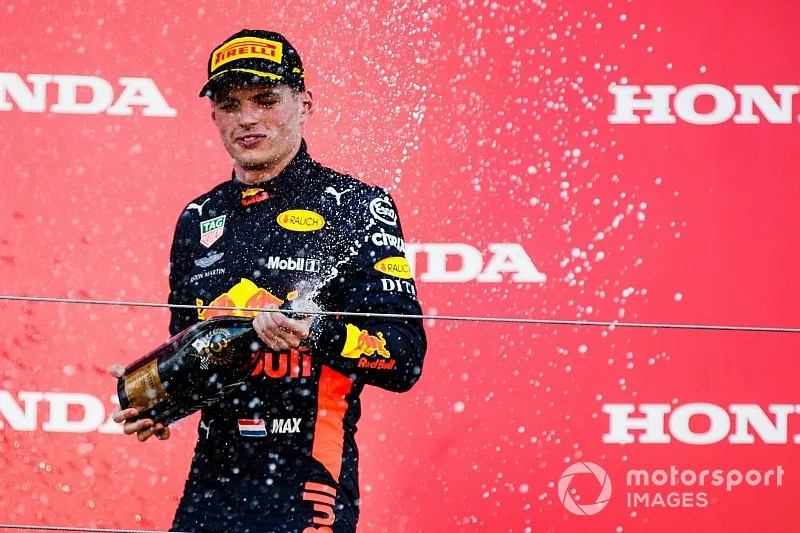 Third place Max Verstappen, Red Bull Racing, sprays Champagne on the podium 