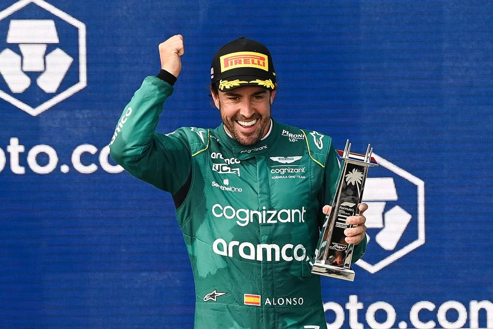 Fernando Alonso, Aston Martin F1 Team, 3rd position, with his trophy on the podium