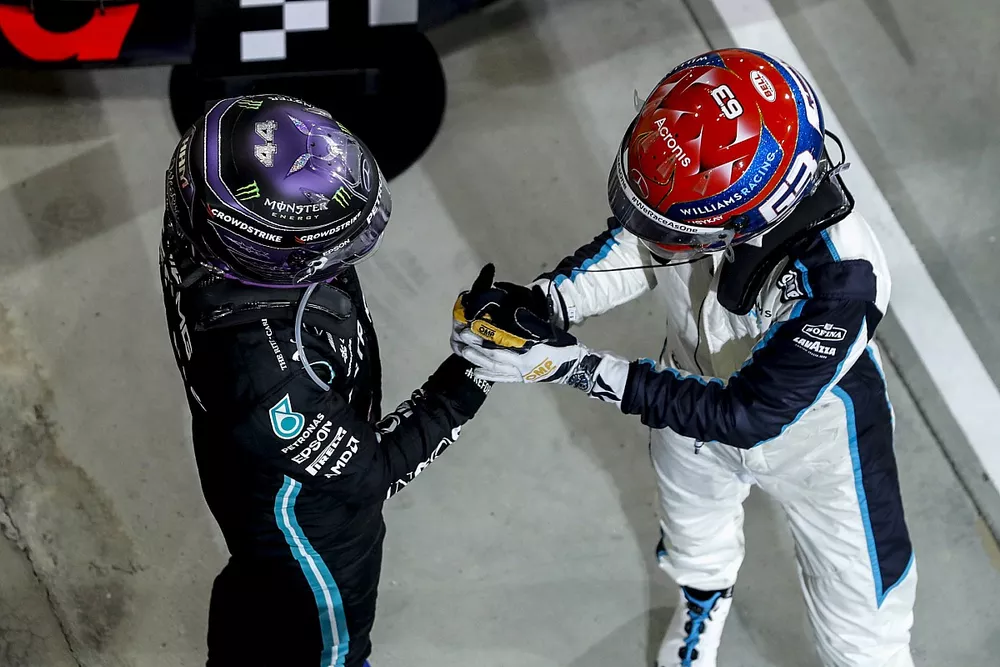 Race winner Lewis Hamilton, Mercedes celebrates in Parc Ferme with George Russell, Williams
