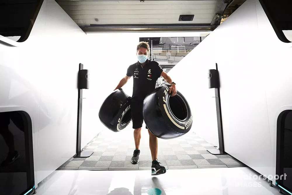 Mercedes mechanic with Pirelli tyres