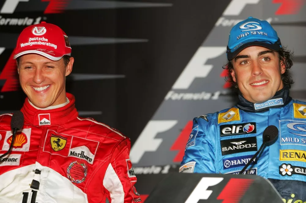 Michael Schumacher,  Ferrari and race winner Fernando Alonso, Renault in the post race press conference