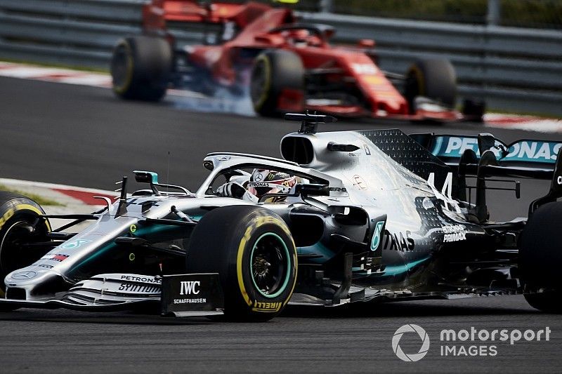 Lewis Hamilton, Mercedes AMG F1 W10, y Charles Leclerc, Ferrari SF90