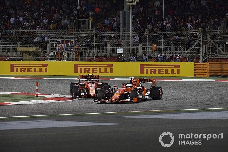 Sebastian Vettel, Ferrari SF90, battles with Charles Leclerc, Ferrari SF90