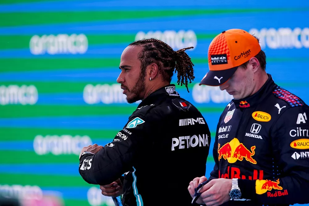 Lewis Hamilton, Mercedes, 1st position, and Max Verstappen, Red Bull Racing, 2nd position, on the podium