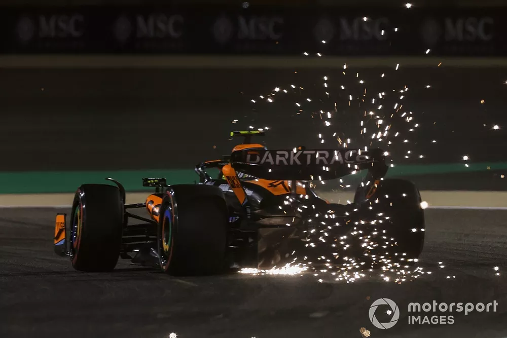 Sparks kick up from Lando Norris, McLaren MCL60