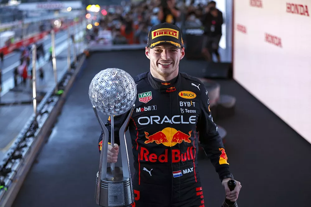 Max Verstappen, Red Bull Racing, 1st position, leaves the podium with his trophy