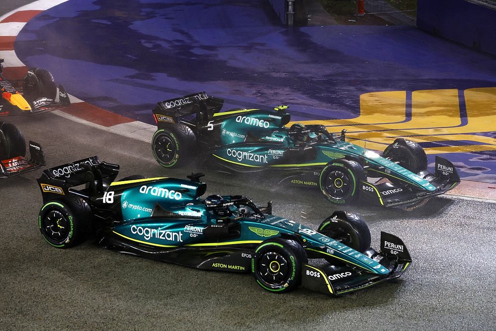 Lance Stroll, Aston Martin AMR22, battles with Sebastian Vettel, Aston Martin AMR22